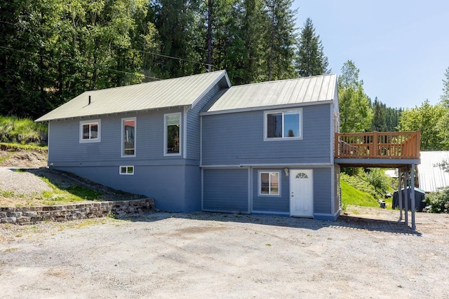 337 Lehigh Hill Rd, Metaline Falls, WA 99153 - view of front of house with a metal roof and a wooden deck