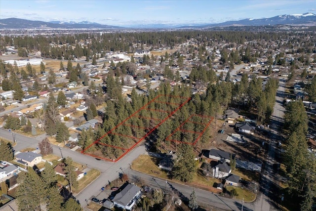 11119 E 27th Ave Lot 3, Spokane Valley, WA 99206 - aerial view of property and surrounding area with a mountainous background and property boundaries highlighted