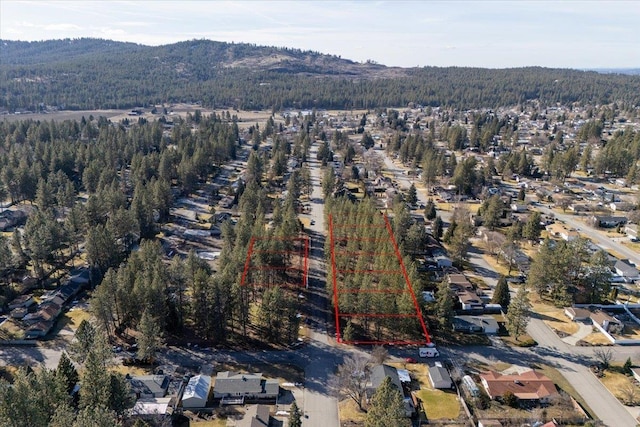 11119 E 27th Ave Lot 3, Spokane Valley, WA 99206 - aerial perspective of suburban area with a forest and mountains