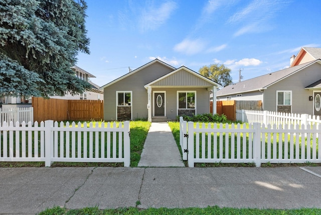 1010 E Montgomery Ave, Spokane, WA 99207 - bungalow-style home featuring a fenced front yard