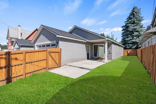 1010 E Montgomery Ave, Spokane, WA 99207 - rear view of property with a patio, a fenced backyard, and a gate