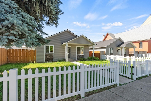 1010 E Montgomery Ave, Spokane, WA 99207 - view of front of property featuring a fenced front yard