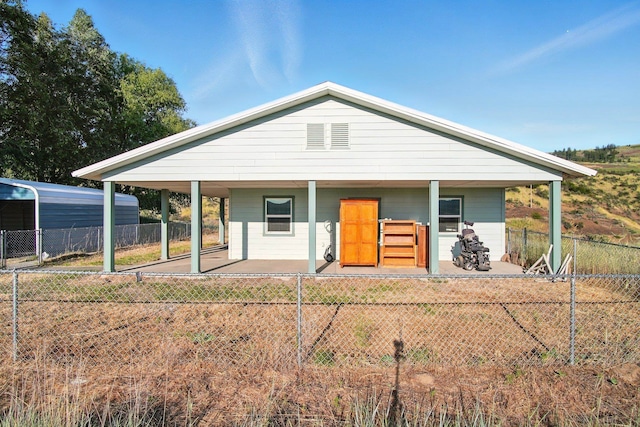 41450 Sunday Bay Rd N, Deer Meadows, WA 99122 - view of front of home featuring covered porch and a fenced backyard