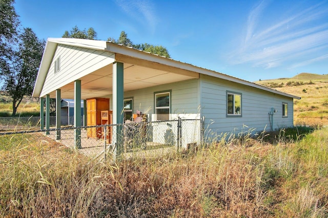41450 Sunday Bay Rd N, Deer Meadows, WA 99122 - view of side of home featuring a porch