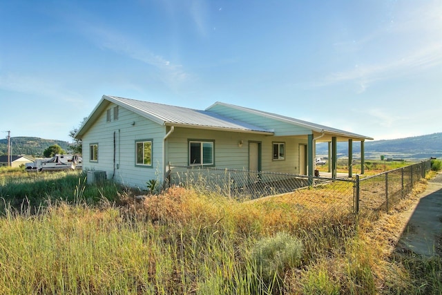 41450 Sunday Bay Rd N, Deer Meadows, WA 99122 - view of property exterior featuring a metal roof and a mountain view