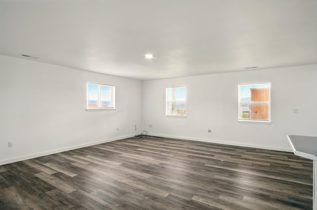41450 Sunday Bay Rd N, Deer Meadows, WA 99122 - empty room featuring dark wood-style flooring and baseboards