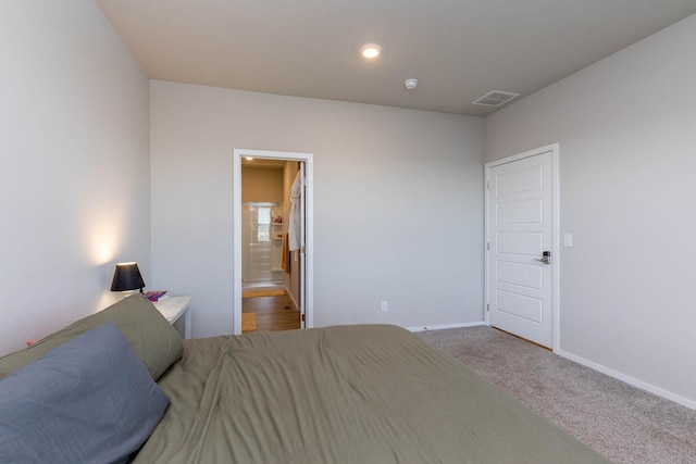 5414 E Bridgeport Ct, Spokane, WA 99217 - carpeted bedroom with baseboards and connected bathroom