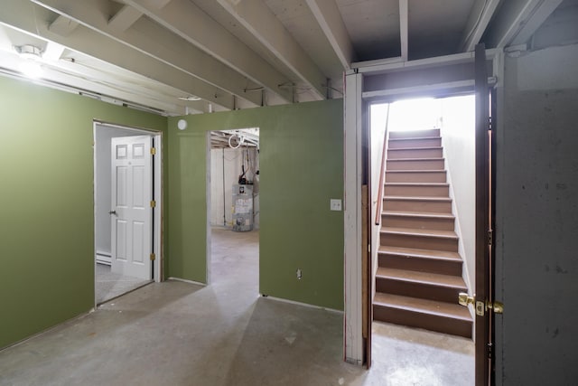 4806 N Drury Rd, Otis Orchards, WA 99027 - below grade area featuring water heater, stairway, and a baseboard heating unit