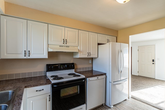 4806 N Drury Rd, Otis Orchards, WA 99027 - kitchen featuring white appliances, under cabinet range hood, white cabinetry, and dark countertops