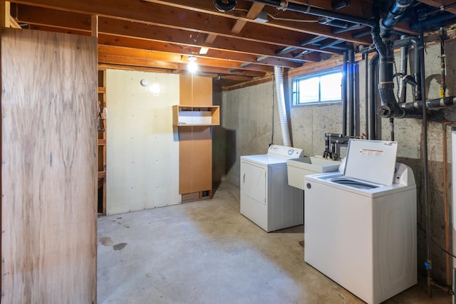 4806 N Drury Rd, Otis Orchards, WA 99027 - basement with washer and clothes dryer and a sink