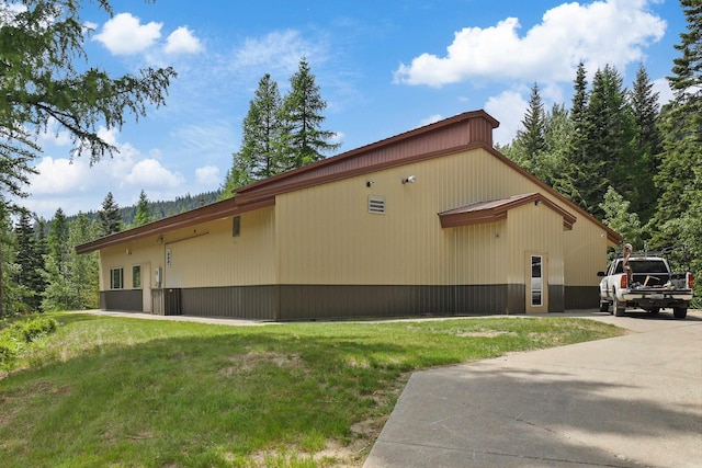 28600 N Mt Spokane Park Dr Unit 506, Mead, WA 99021 - view of home's exterior with a lawn