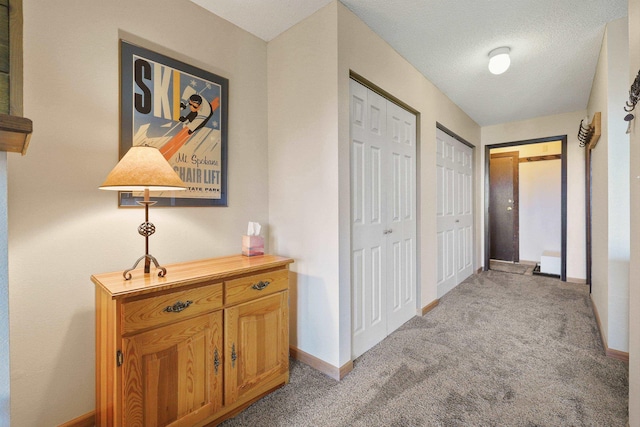 28600 N Mt Spokane Park Dr Unit 506, Mead, WA 99021 - hall featuring baseboards and light colored carpet