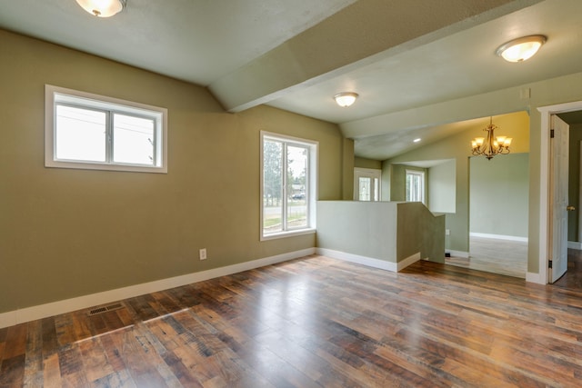 109 E 6th St, Deer Park, WA 99009 - empty room with vaulted ceiling, a chandelier, healthy amount of natural light, and dark wood-style flooring