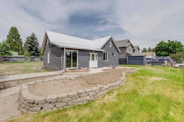 109 E 6th St, Deer Park, WA 99009 - back of house featuring a metal roof