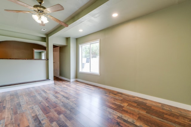 109 E 6th St, Deer Park, WA 99009 - unfurnished bedroom featuring recessed lighting, wood finished floors, a ceiling fan, beam ceiling, and arched walkways