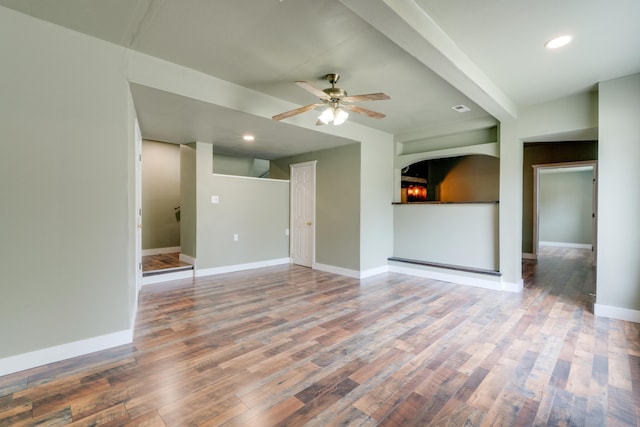 109 E 6th St, Deer Park, WA 99009 - unfurnished living room featuring a ceiling fan, wood finished floors, and recessed lighting