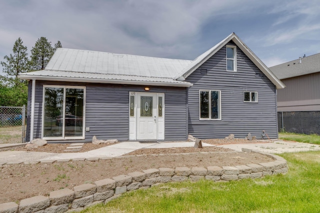 109 E 6th St, Deer Park, WA 99009 - rear view of house with a metal roof