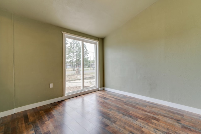 109 E 6th St, Deer Park, WA 99009 - spare room with wood finished floors and vaulted ceiling