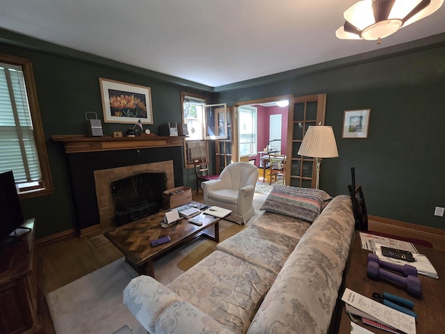 726 W 6th Ave Unit # 205, Spokane, WA 99204 - living area featuring a fireplace and wood finished floors