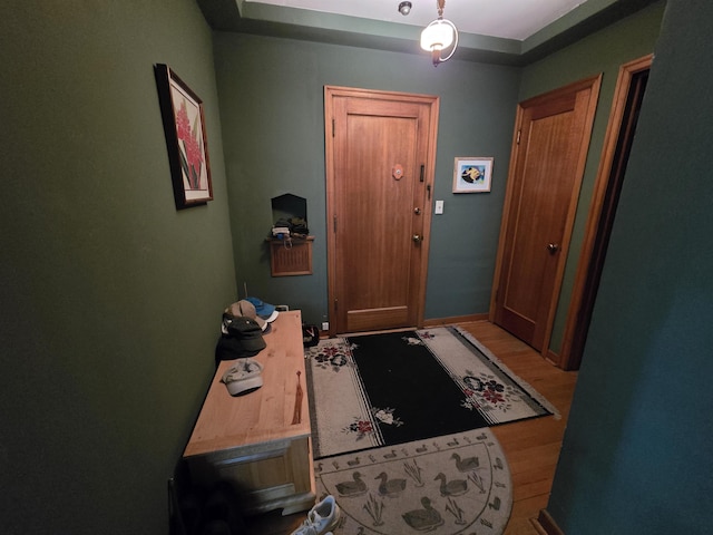 726 W 6th Ave Unit # 205, Spokane, WA 99204 - entryway with wood finished floors and baseboards