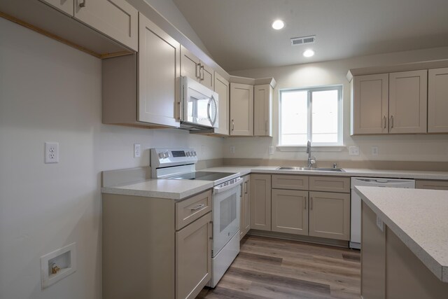 18424 E 1st Ln, Greenacres, WA 99016 - kitchen featuring white appliances, light countertops, wood finished floors, and recessed lighting