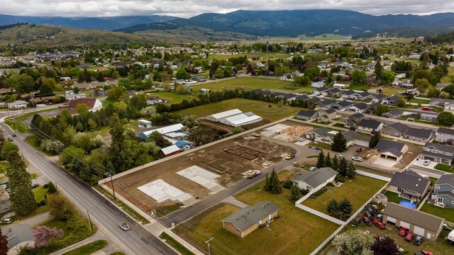18424 E 1st Ln, Greenacres, WA 99016 - aerial view of residential area with a mountainous background