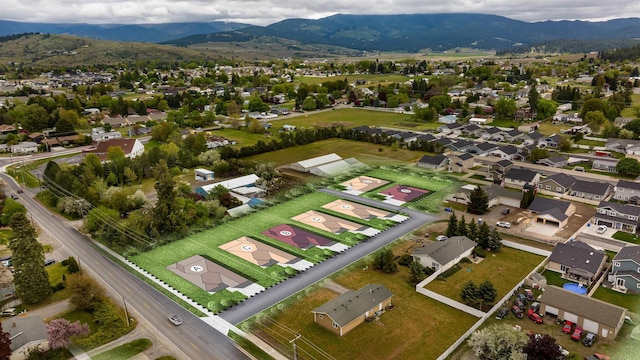18424 E 1st Ln, Greenacres, WA 99016 - aerial perspective of suburban area with a mountain backdrop