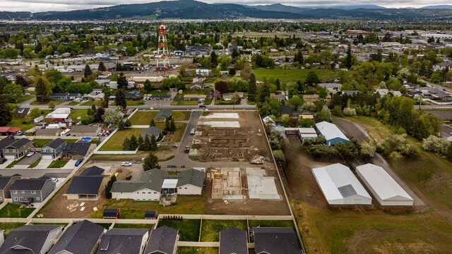 18424 E 1st Ln, Greenacres, WA 99016 - aerial view of property and surrounding area with nearby suburban area