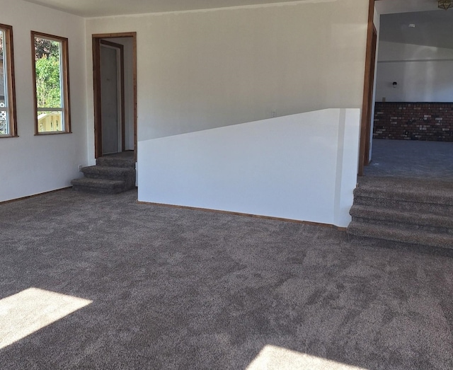 427 W 7th St, Newport, WA 99156 - carpeted spare room featuring stairs