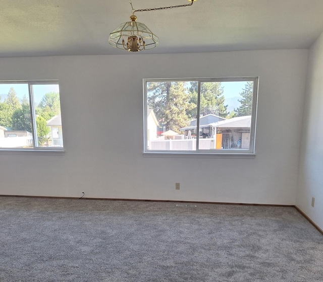 427 W 7th St, Newport, WA 99156 - empty room with carpet flooring and baseboards
