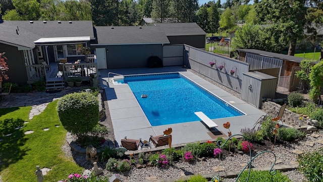 1407 S Shamrock St, Veradale, WA 99037 - view of swimming pool featuring a wooden deck and a diving board