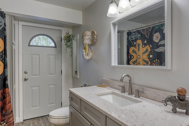 1407 S Shamrock St, Veradale, WA 99037 - bathroom featuring vanity and wood finished floors