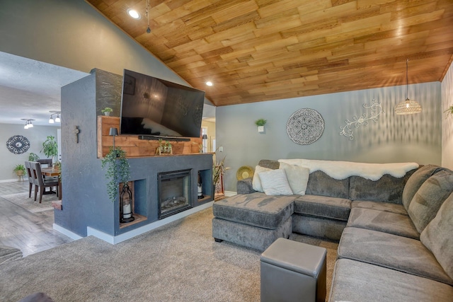 1407 S Shamrock St, Veradale, WA 99037 - living area with wooden ceiling, wood finished floors, a fireplace, and high vaulted ceiling