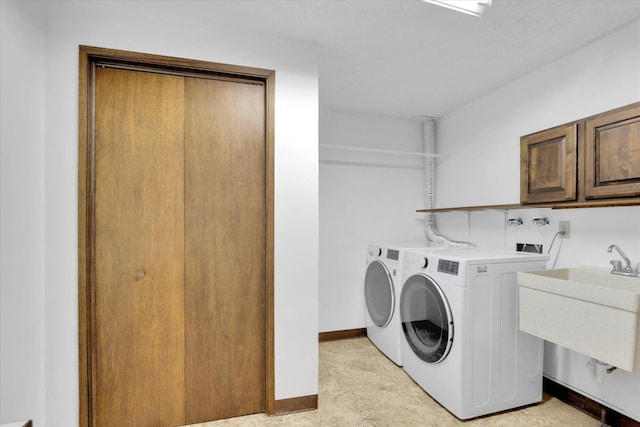 5311 W Shawnee Ave, Spokane, WA 99208 - washroom with cabinet space and separate washer and dryer