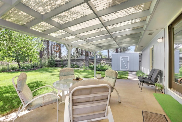 5311 W Shawnee Ave, Spokane, WA 99208 - view of patio / terrace with a storage shed, outdoor dining space, and a pergola