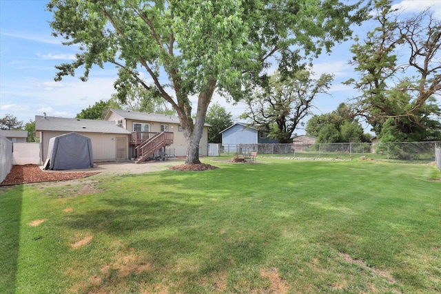 1508 N Arc St, Spokane Valley, WA 99016 - fenced backyard with stairs and a deck