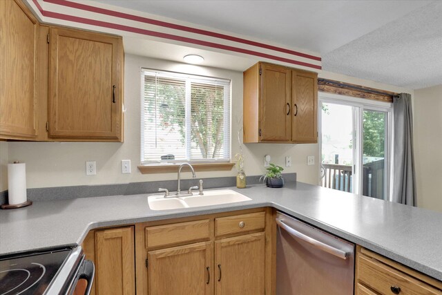 1508 N Arc St, Spokane Valley, WA 99016 - kitchen featuring appliances with stainless steel finishes and light countertops