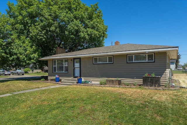 10413 E 6th Ave, Spokane Valley, WA 99206 - view of front of property with a chimney and a front yard