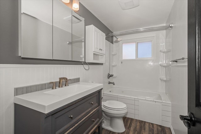 10413 E 6th Ave, Spokane Valley, WA 99206 - full bath with tub / shower combination, vanity, a wainscoted wall, and wood finished floors