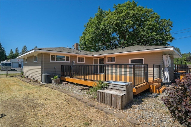 10413 E 6th Ave, Spokane Valley, WA 99206 - back of house featuring a wooden deck