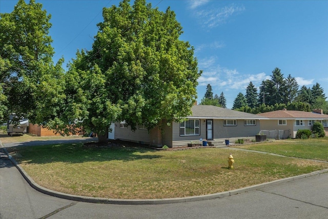 10413 E 6th Ave, Spokane Valley, WA 99206 - view of front facade featuring a front lawn
