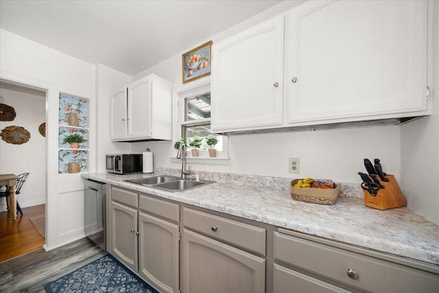 3328 W Kiernan Ave, Spokane, WA 99205 - kitchen with stainless steel appliances, wood finished floors, and gray cabinets