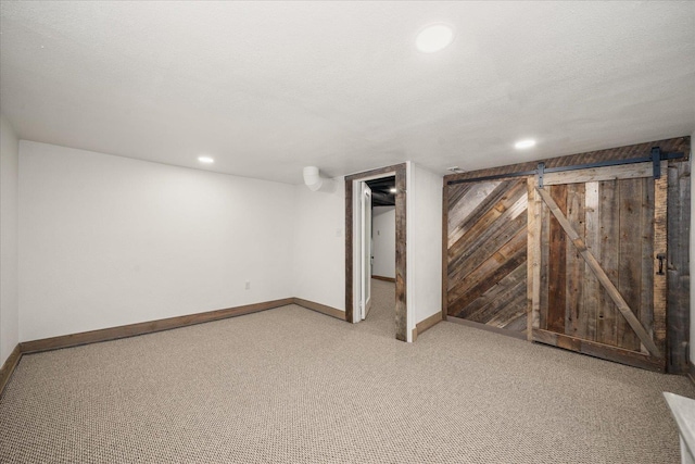 3328 W Kiernan Ave, Spokane, WA 99205 - finished basement featuring light colored carpet, recessed lighting, and a barn door