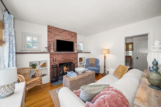 3328 W Kiernan Ave, Spokane, WA 99205 - living area with a brick fireplace and wood finished floors