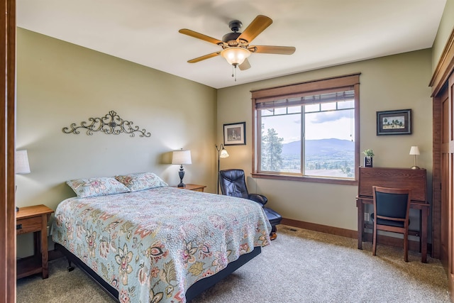 21617 E Harvard Vistas Ln, Newman Lake, WA 99025 - carpeted bedroom with ceiling fan and a mountain view