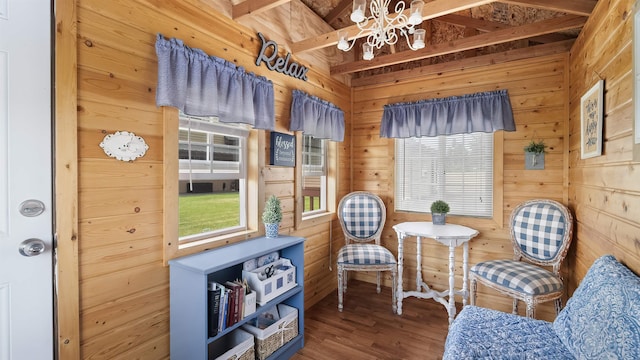 21617 E Harvard Vistas Ln, Newman Lake, WA 99025 - living area with a chandelier, wood walls, and wood finished floors