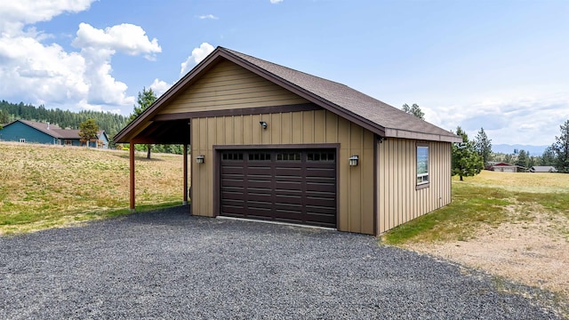 21617 E Harvard Vistas Ln, Newman Lake, WA 99025 - detached garage featuring gravel driveway