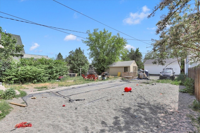314 E Everett Ave, Spokane, WA 99207 - view of yard with a storage shed
