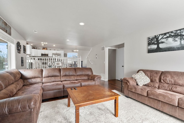 9805 N Jesse Ct, Spokane, WA 99208 - living room with plenty of natural light, light wood-type flooring, recessed lighting, and a chandelier