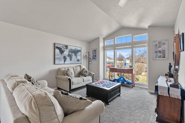 9805 N Jesse Ct, Spokane, WA 99208 - carpeted living room featuring lofted ceiling, healthy amount of natural light, and a textured ceiling